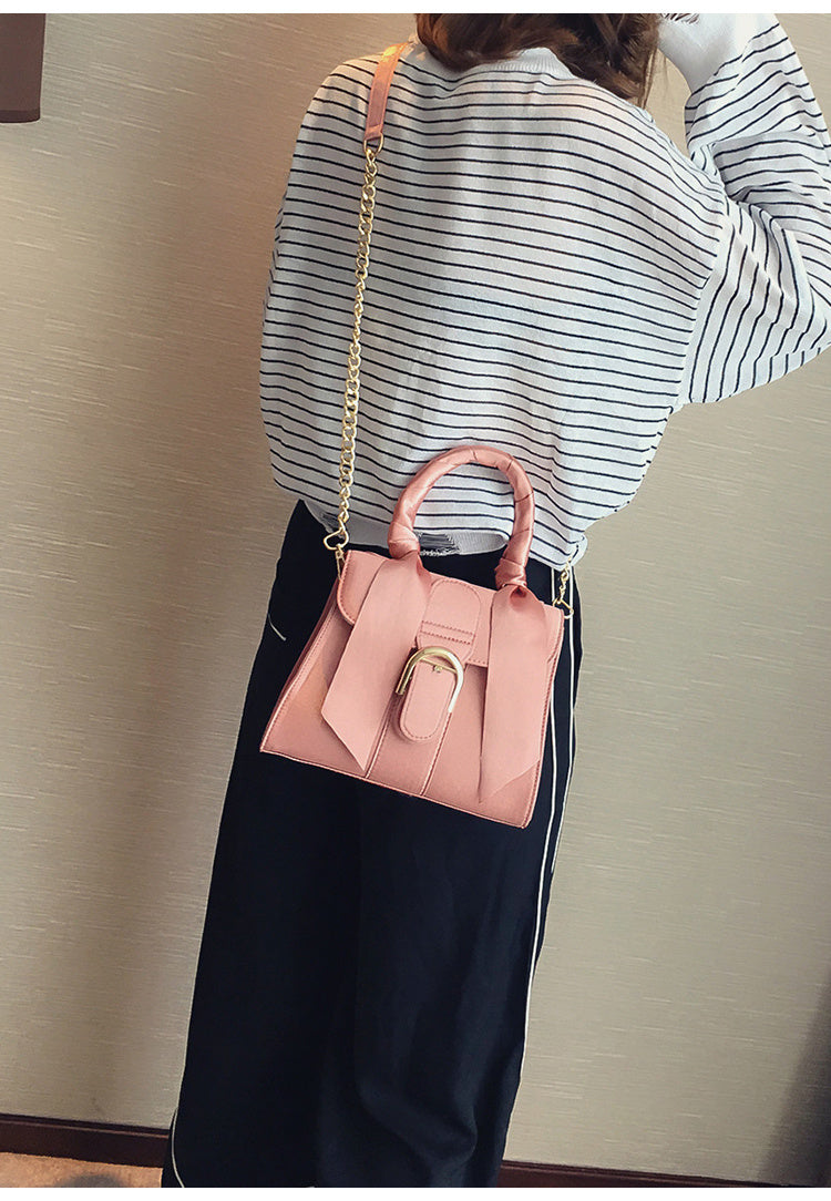 Bow diagonal handbag