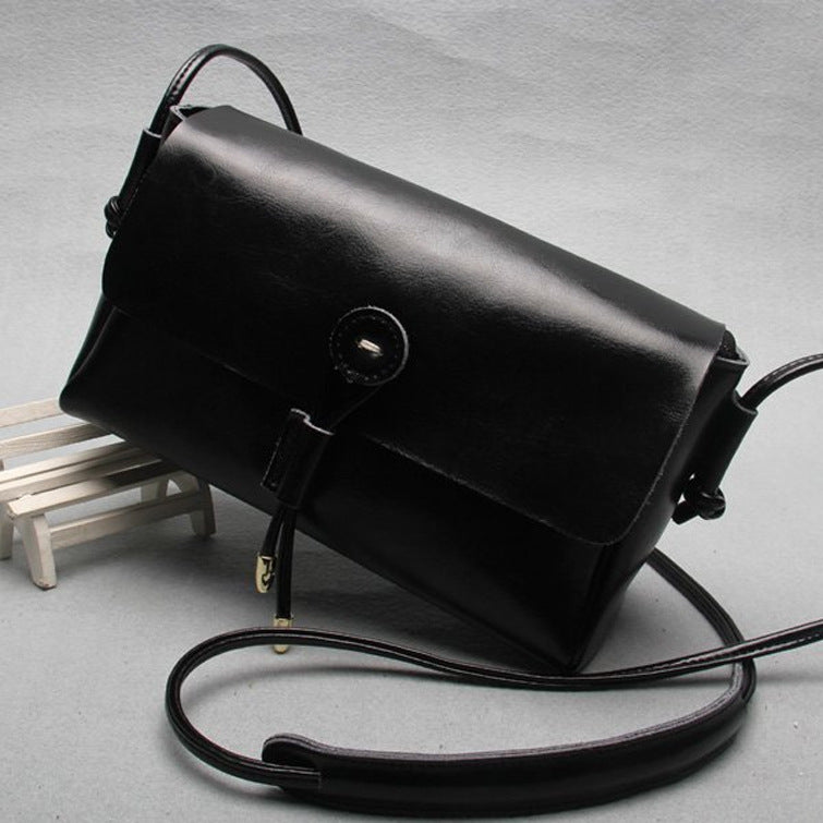 Leather bag bag buttons Korea 2015 new fashion shoulder bag ladies bags wholesale cross retro trend