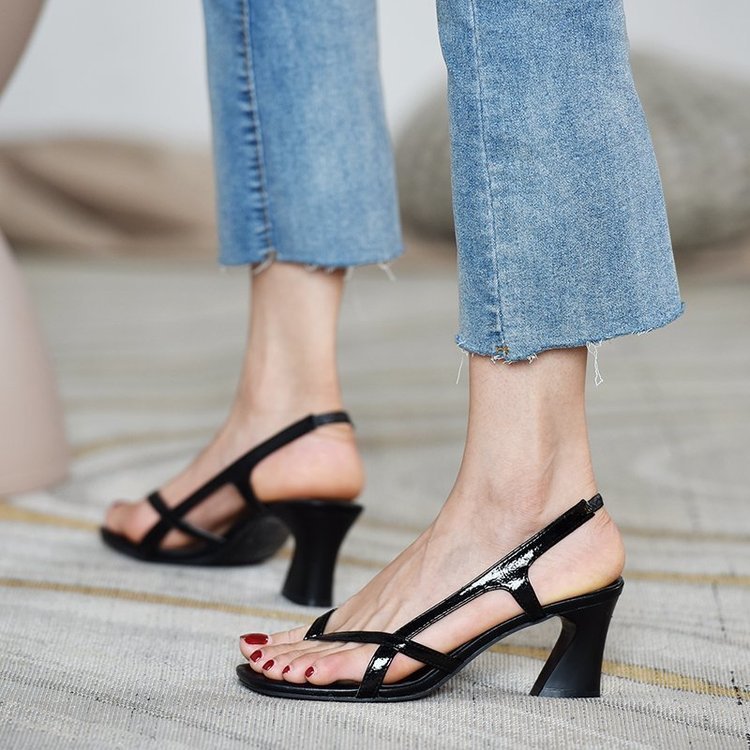 Woman with thick heel and high heel and toe sandals